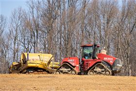 Pottstown Division: A Case IH Steiger 580 with a K-Tec 1228 scraper unloads dirt on a pad.