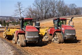 Pottstown Division: Two Case IH Steiger tractor scrapers work the cut.