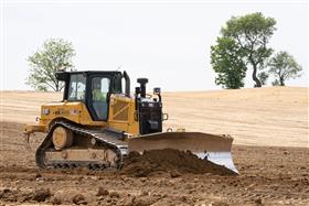 Landis C. Deck & Sons Division: A Caterpillar D6 grades a pad.