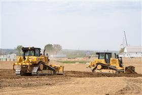 Landis C. Deck & Sons Division: Two Caterpillar D6's work on a site together. 