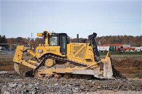 Harrisburg Division: A Caterpillar D8T grades a pad. 