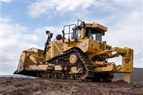 Pottstown Division: A Caterpillar D8T rips soil.