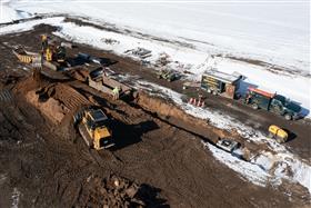 Haines & Kibblehouse, Inc.: A pipe crew works on a section at a job site. 