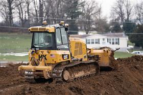 Pottstown Division: A Caterpillar D5K2 stockpiles soil.