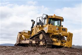 Pottstown Division: A Caterpillar D8T rips soil.