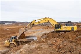 Harrisburg Division: A Komastu PC800 loads a Caterpillar 740B with material. 