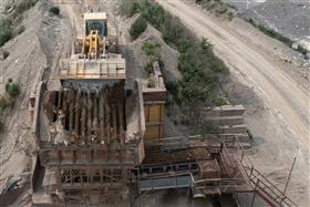 Belvidere Sand & Gravel: A Komatsu WA-600 feeds a hopper with material from the pit. 